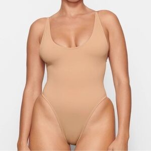 Skims Tan one piece swim